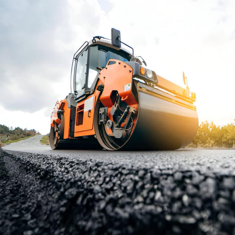 Road construction equipment working on an Indian infrastructure project