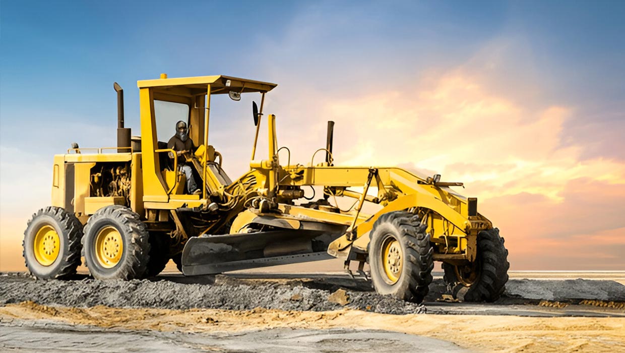 motor grader is operating on a construction site