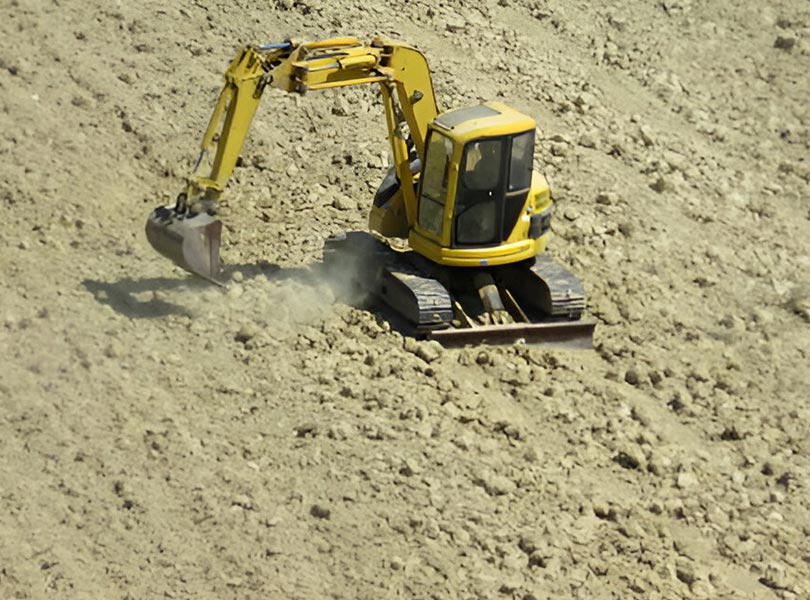 Compact excavator in the agriculture field