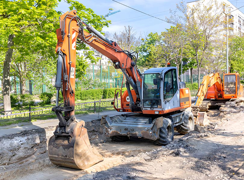 Wheel Excavator Working in City Road