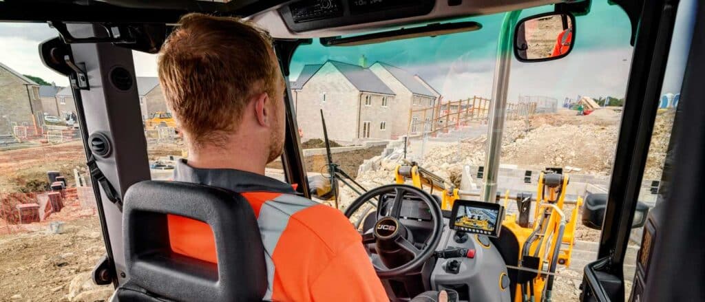 Operator cabin and controls of a JCB backhoe loader